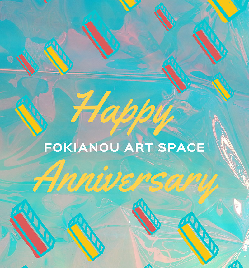 Geometric design in blueish background with slanted 3D yellow and red rectangular shapes. Centered in yellow cursive says Happy Aniversary. Between the two lines: Fokianou Art Space in regular capital white letters